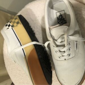 Stylish White Sneakers with Black and Tan Sole